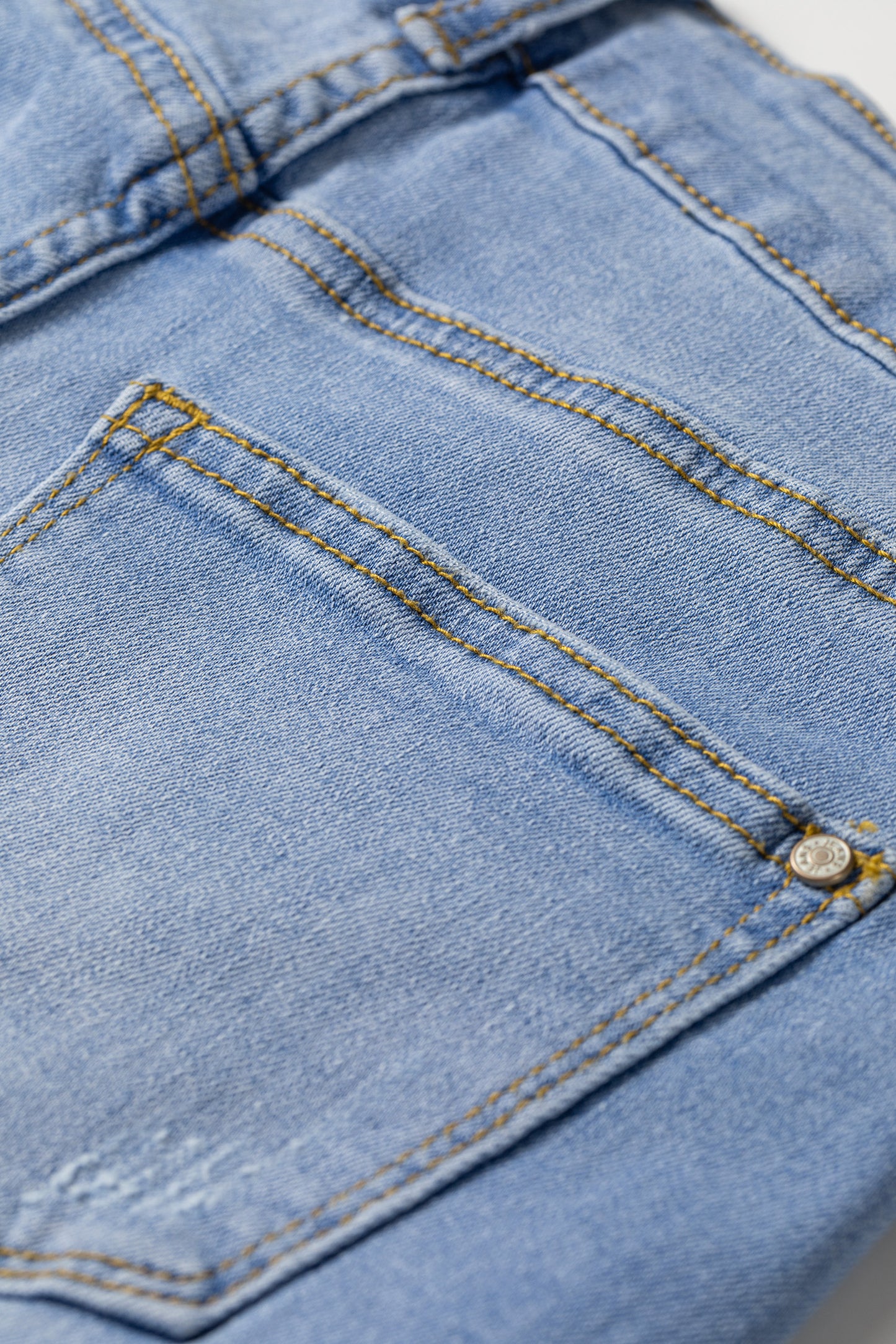 Beau Blue Asymmetric Raw Hem Distressed Whiskery Denim Shorts