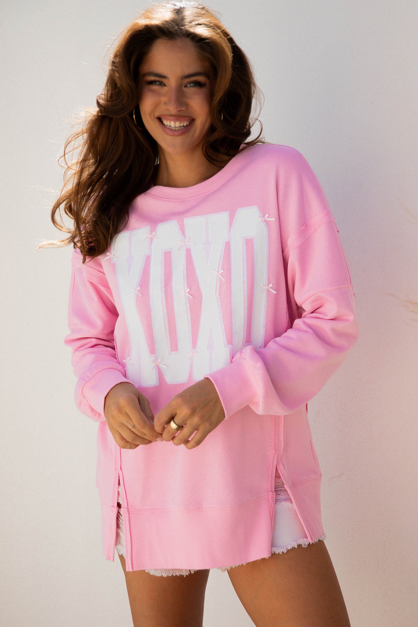 Black Bow Sequin XOXO Letter Graphic Exposed Seam Baggy Sweatshirt